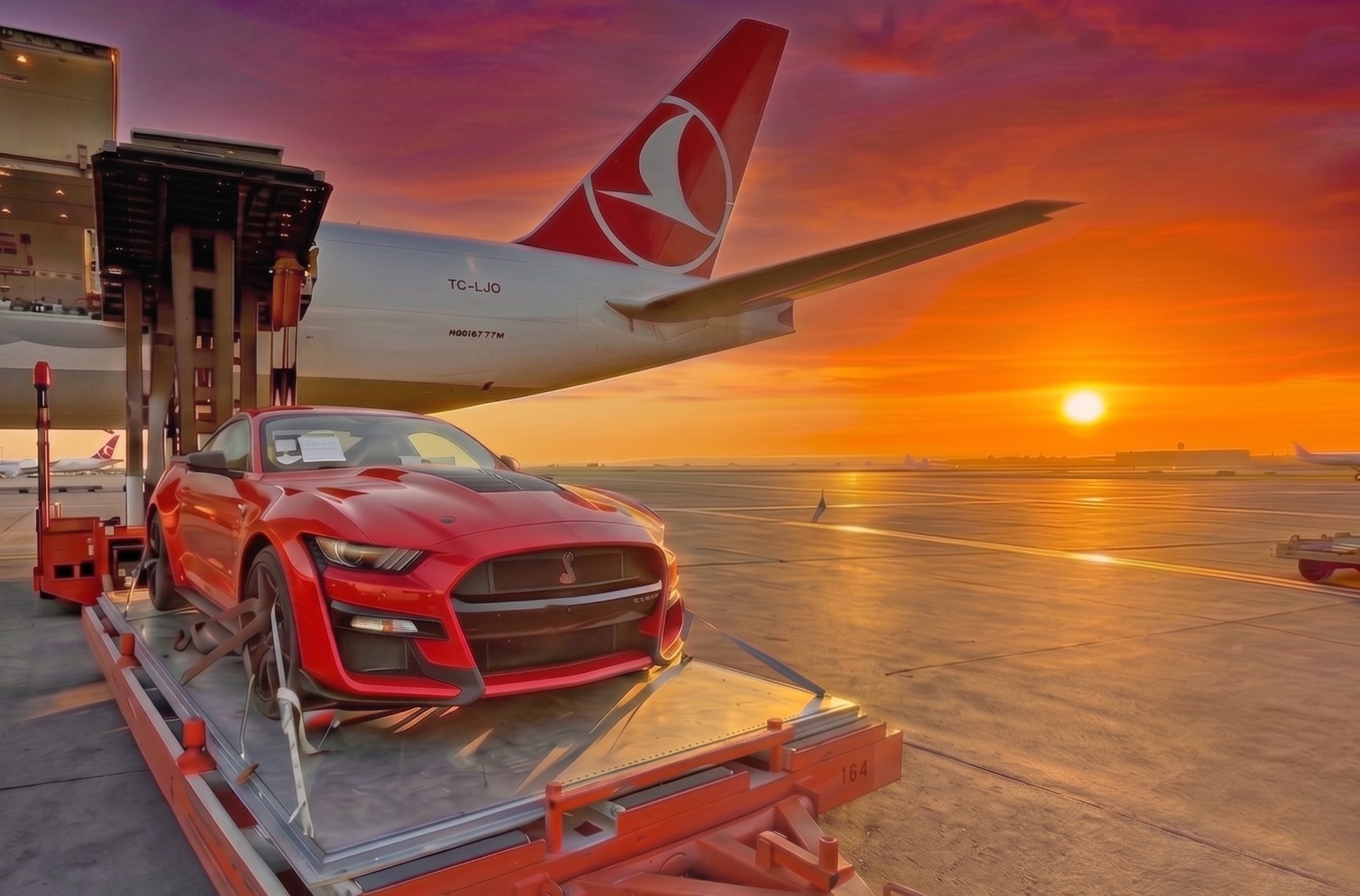 Exportia DMS luxury vehicle worldwide shipment